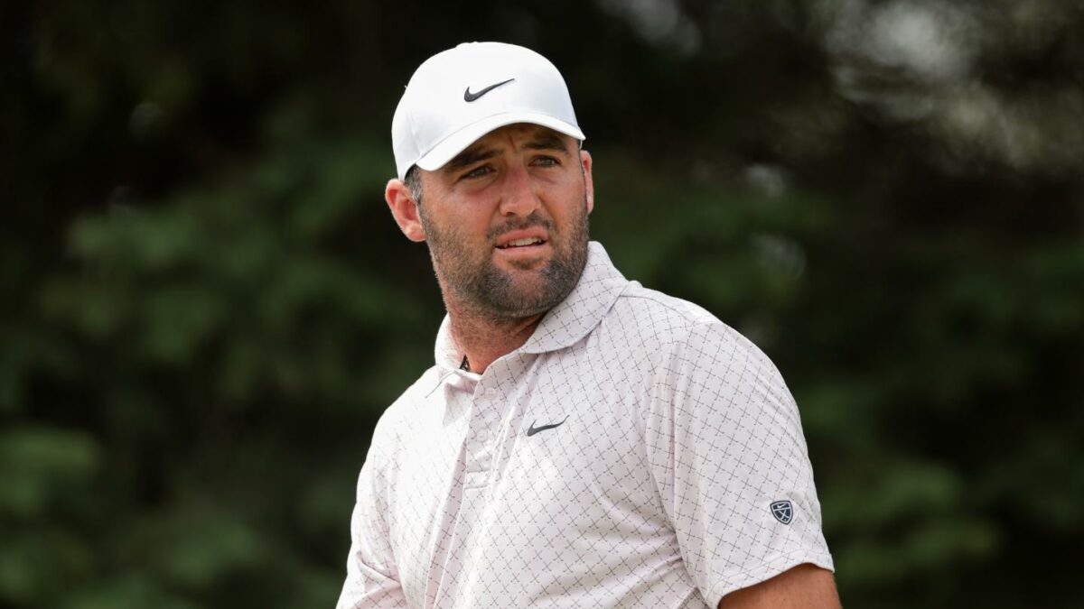 Golfer in white hat